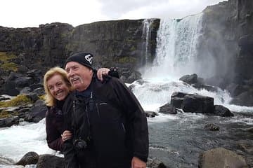 Posing at the waterfall Öxarárfoss at the National Park