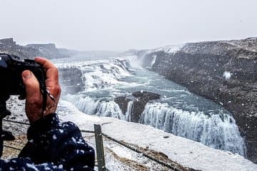 The grate waterfall Gullfoss in a snow drift