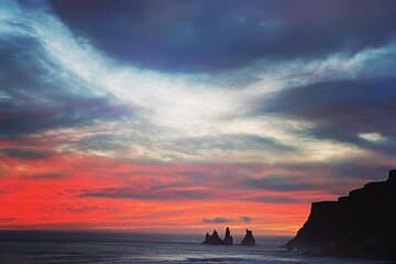 Reynisdrangar sea cliffs in front of the Black Sand Beach at the South Coast