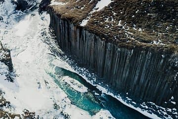 Hidden in East Iceland, Stuðlagil Canyon is your next unforgettable adventure.