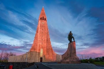 Hallgrímskirkja: The iconic Lutheran church and statue of Leif Erikson, symbols of Iceland.