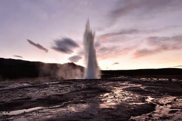 Geyser Strokkur in Midnight Sun Light