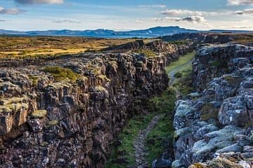 Þingvellir (Thingvellir) is a historic site and national park in Iceland, east of Reykjavík. It's known for the Alþing (Althing), the site of Iceland's parliament from the 10th to 18th centuries.