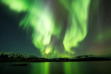 Dancing lights over Iceland! Experience the magic of the Northern Lights as they paint the Arctic sky in shades of green — a breathtaking natural wonder you’ll never forget.