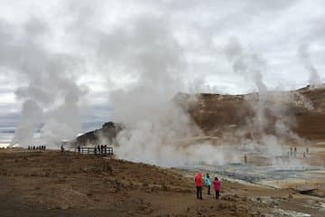 Mud pits and steaming geysers