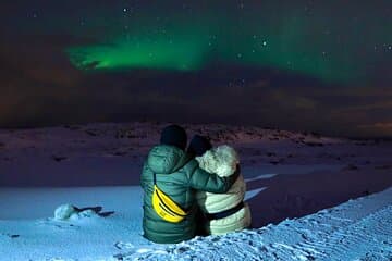 Romantic moment under the northern lights