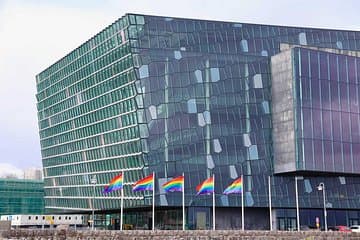 The Harpa Concert Hall during Reykjavik Pride, showing rainbow flags in support of the LGBTQ Community