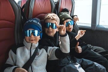 Three guests enjoying the Monster Truck ride!