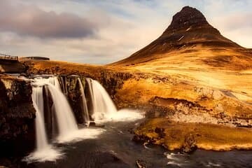 Kirkjufell, with its symmetrical peak and nearby cascading falls, is a picture-perfect scene straight from a fairytale