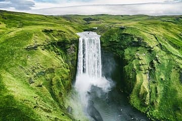 Discover hidden waterfalls tucked into Iceland’s dramatic landscapes
