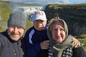 Happy guests at Gullfoss waterfall.